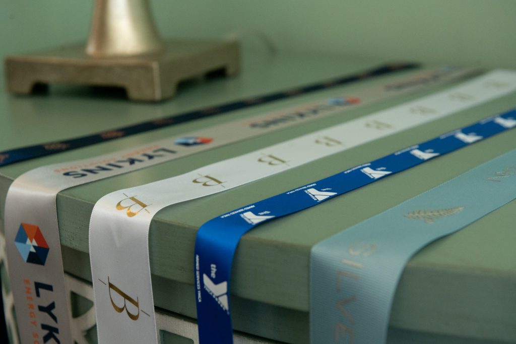 custom branded ribbon, custom dyed ribbon, satin logo ribbon, ribbon with logo, promotional ribbon, corporate logo ribbon, custom event ribbon, personalized logo ribbon, custom logo ribbon