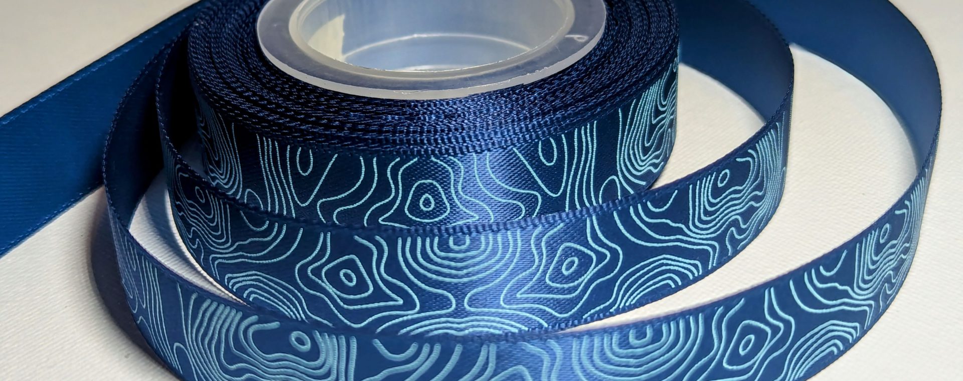 custom branded ribbon, custom satin ribbon, satin ribbon with pattern, continuous printed ribbon, custom designed ribbon