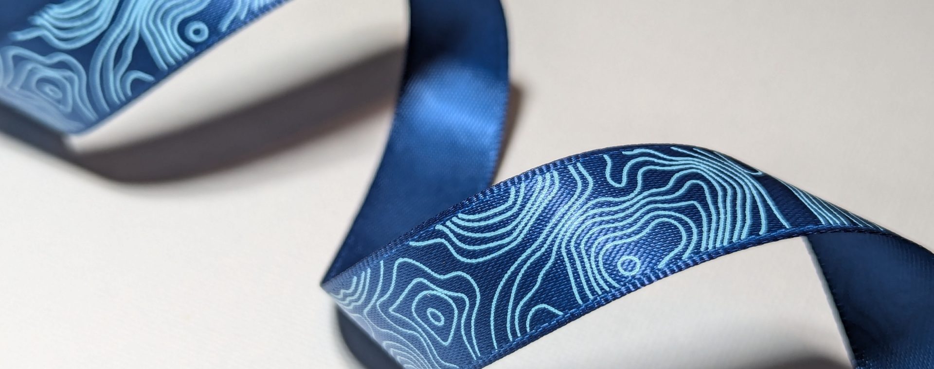 custom design ribbon, ribbon with continuous design, custom pattern ribbon, Pantone matching ribbon, custom satin ribbon