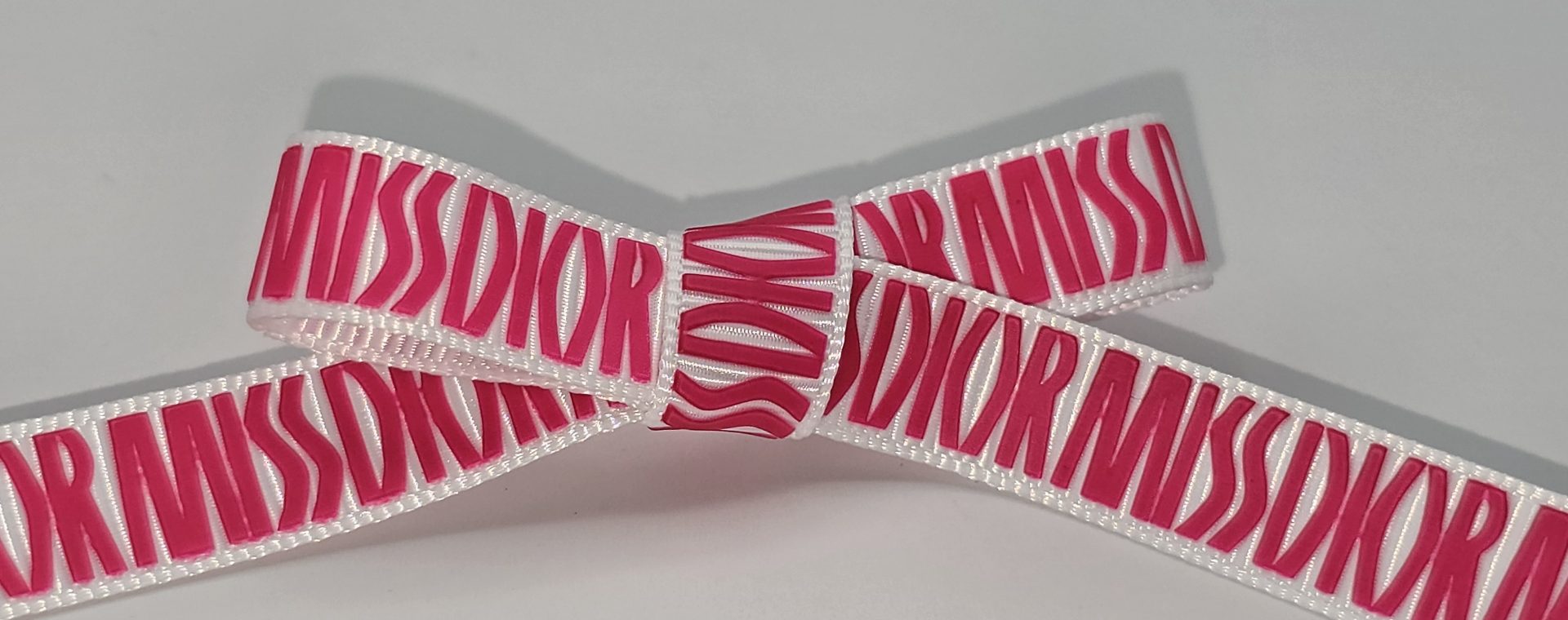 custom logo grosgrain ribbon, custom logo ribbon, custom pantone matching ribbon, raised print on grosgrain ribbon, pantone matching branding ribbon