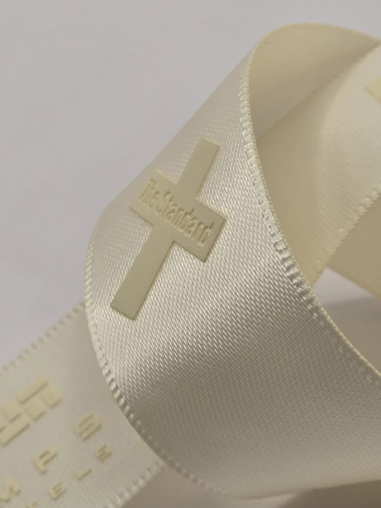 custom logo ribbon, custom ribbon, custom satin ribbon, raised print on ribbon, embossed print on ribbon, custom imprinted satin ribbon