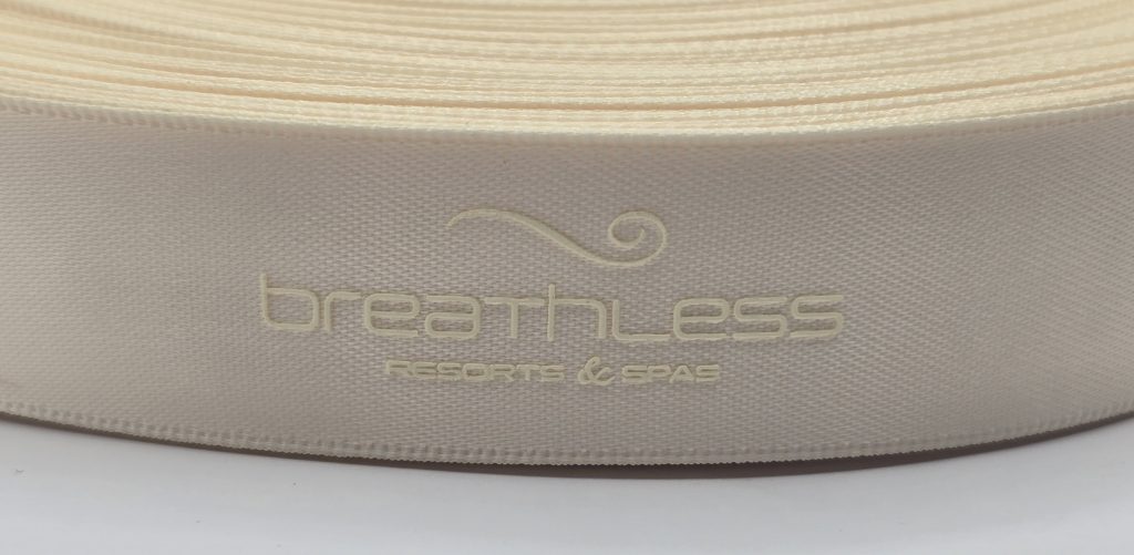 custom logo ribbon, tone on tone ribbon, satin Pantone matching ribbon, ivory logo ribbon, Pantone printed logo ribbon