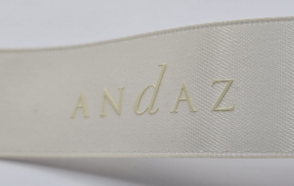 custom logo satin ribbon, tone on tone logo ribbon, customized logo ribbon, subtle printed ribbon, Pantone matching ribbon