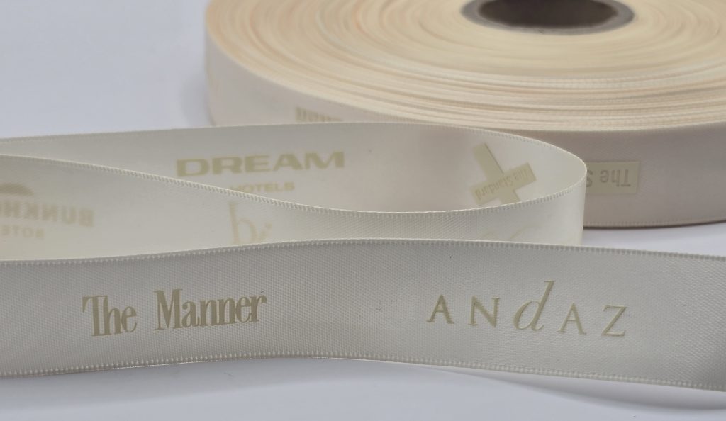 tone on tone logo ribbon, custom satin ribbon, custom logo ribbon, custom company logo ribbon, corporate logo ribbon