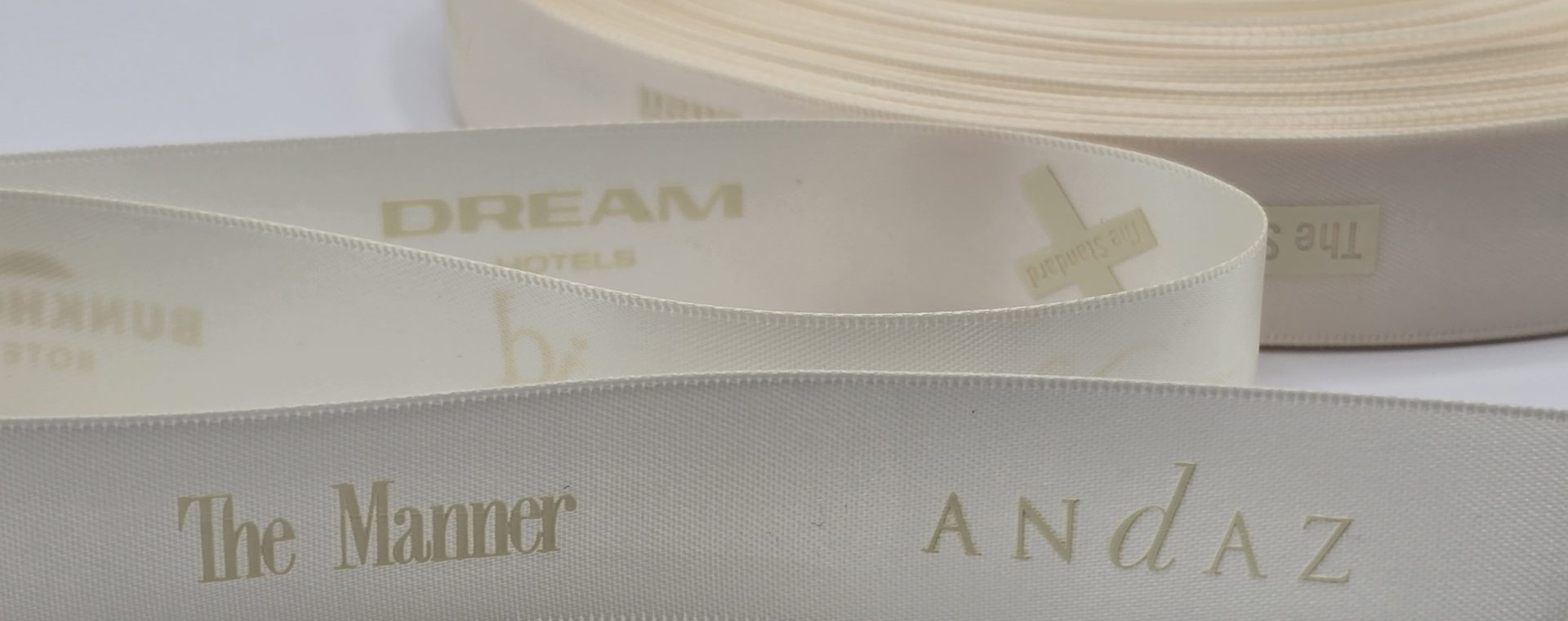 tone on tone logo ribbon, custom satin ribbon, custom logo ribbon, custom company logo ribbon, corporate logo ribbon